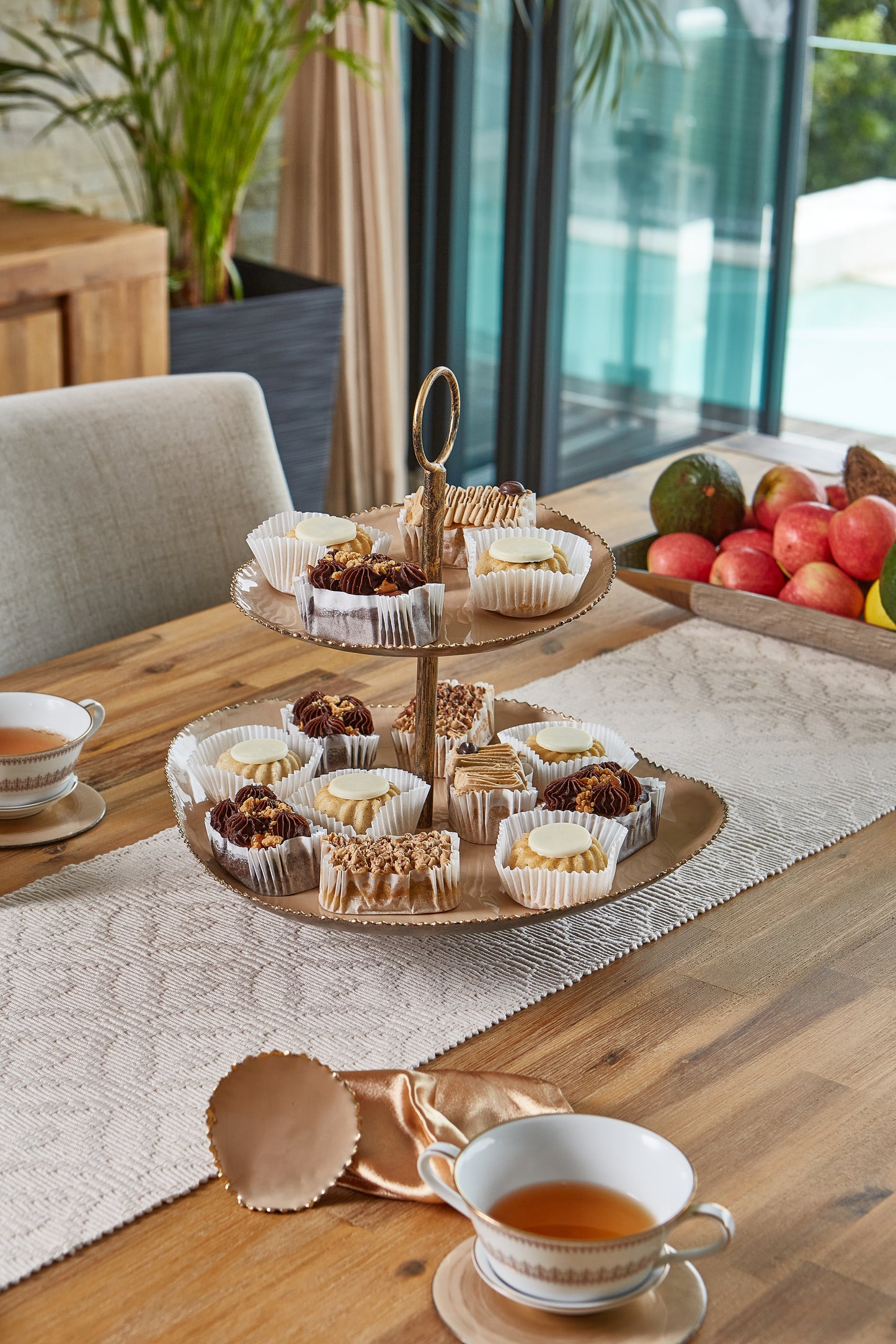 Two tier cake stand with matching napkin rings and coaster